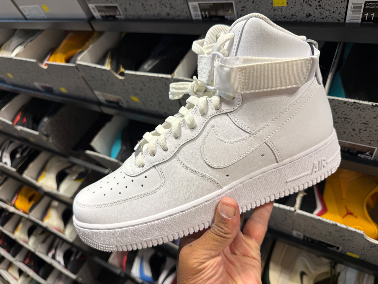 Nike Air Force 1 High Triple White Hits The Loop for $79.99 at Nike Clearance Store — Kissimmee