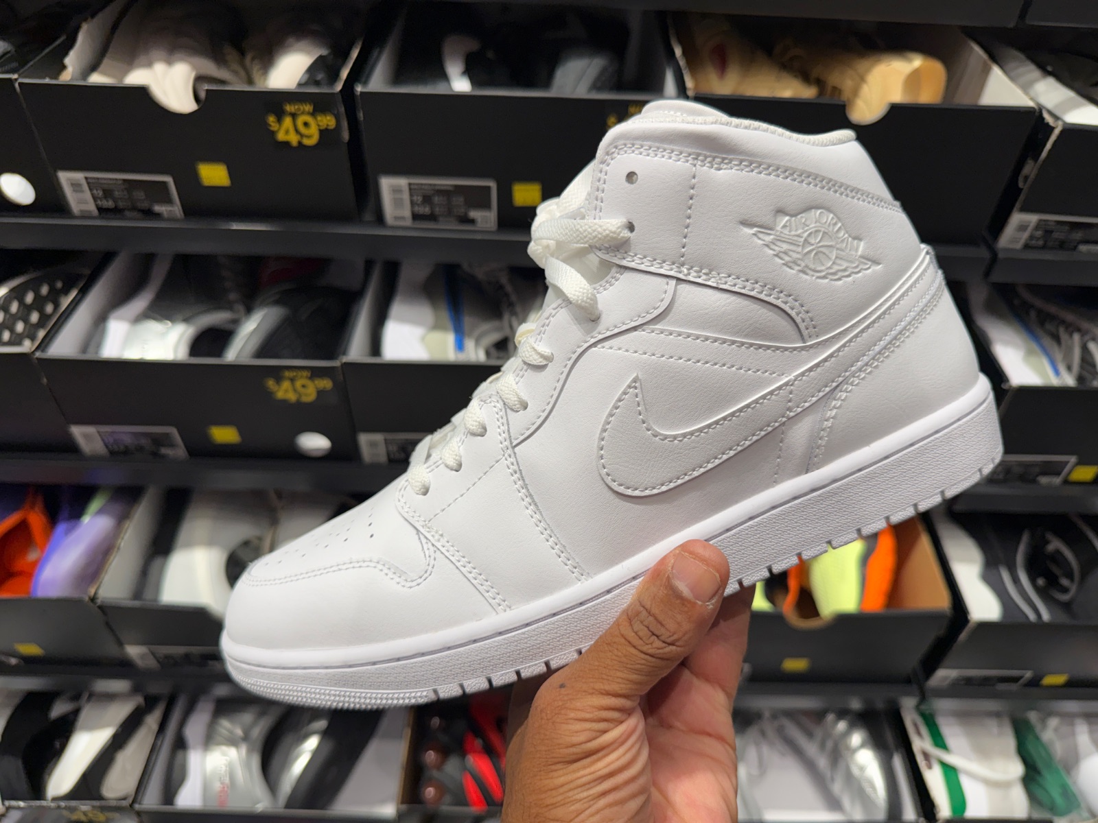 Triple White Jordan 1 Mids Drop to $79.99 at The Loop at Nike Clearance Store — Kissimmee
