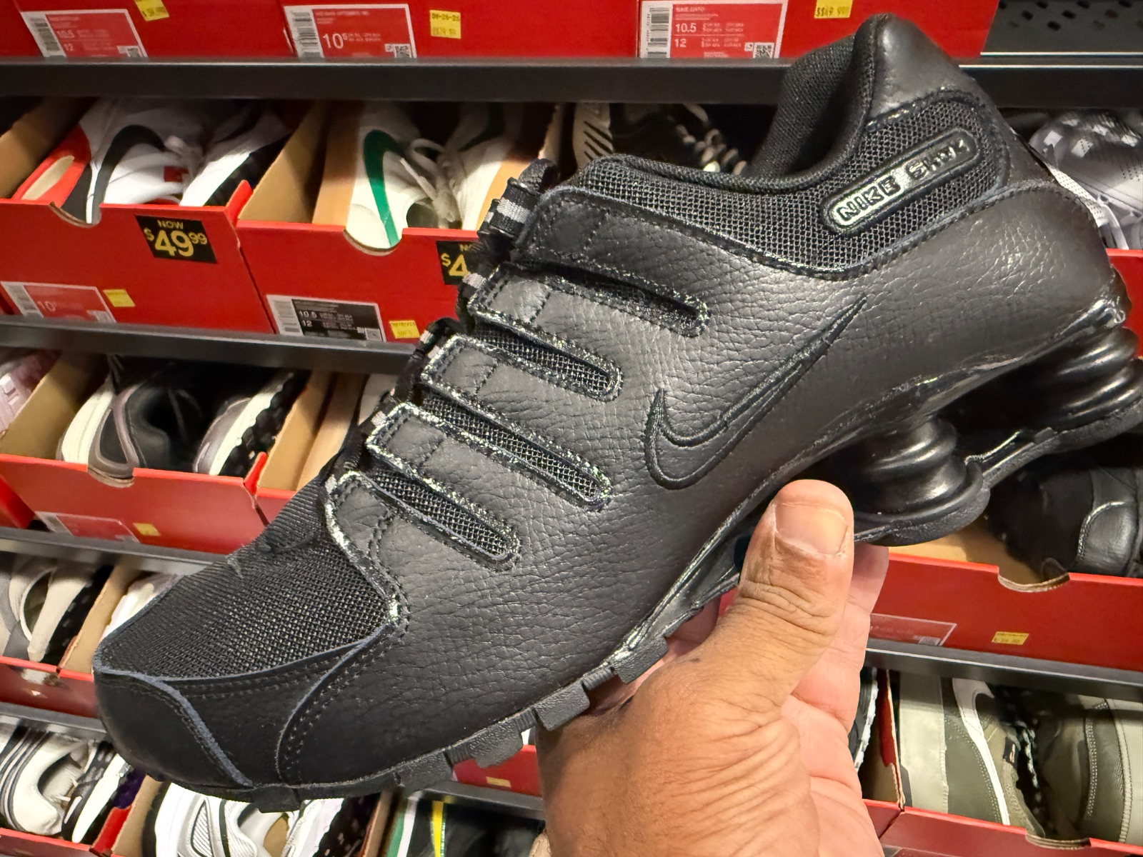 Triple Black Nike Shox NZ Hits $59.99 at The Loop at Nike Clearance Store — Kissimmee