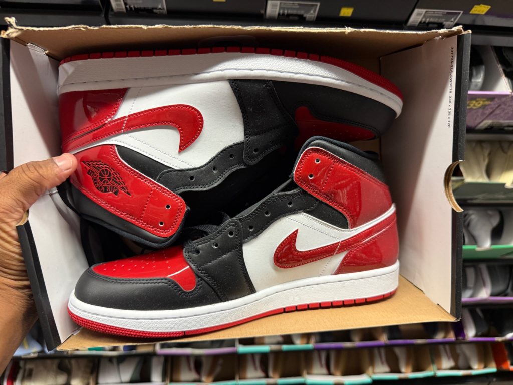 Jordan 1 Mid Patent Bred Toe Hits Outlet for $79.99
