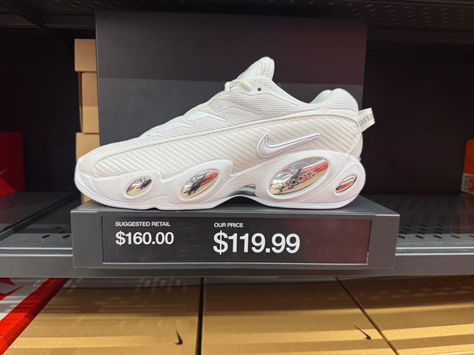 Nike NOCTA Glide White Sits at Outlet for $119.99 at Nike Factory Store — Celebration