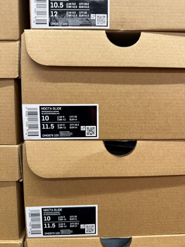 Nike NOCTA Glide White Sits at Outlet for $119.99